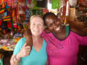 Crew member Evelyn with Joan at her bar at Grand Anse, Grenada